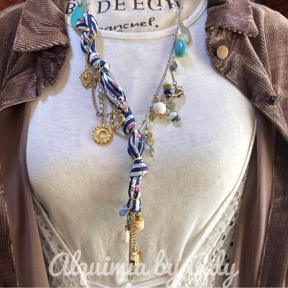 Alquimia Blue and Gold Necklace with Twisted Fabric and Charms